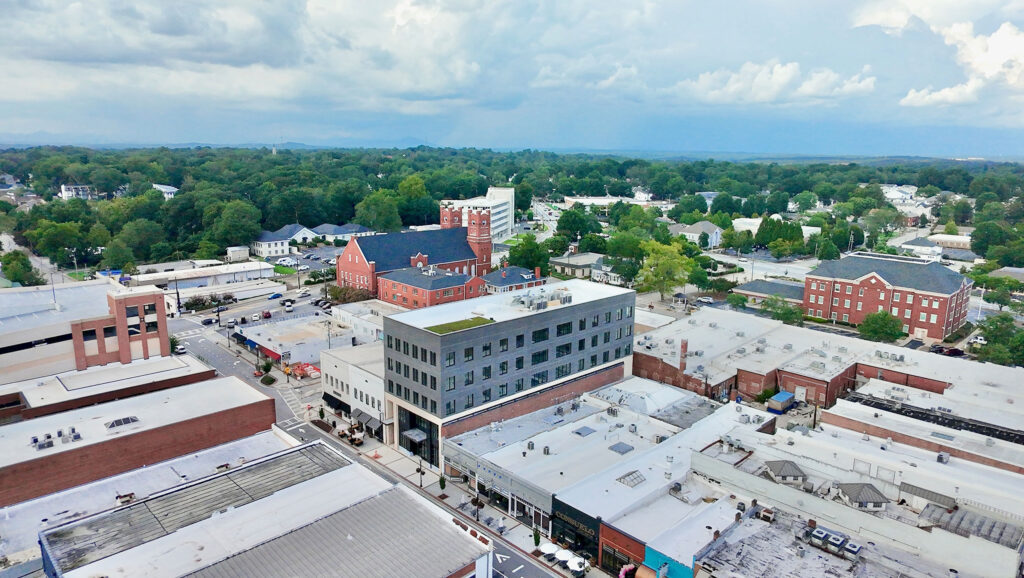 Aerial exterior view of the Bradford Building in downtown Gainesville, mid-construction